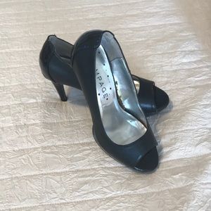 Black leather open toe platform. Brand New no tags